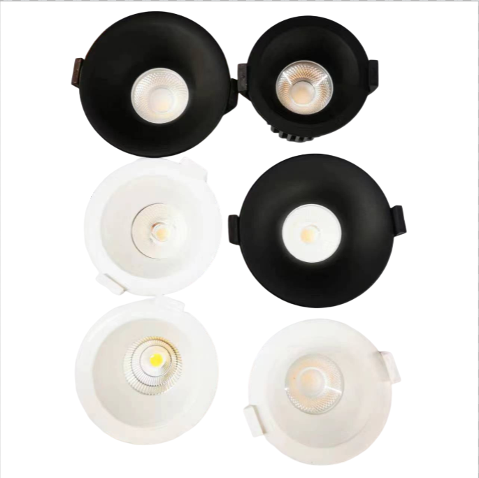 Replaceable module downlight reflector and lens options