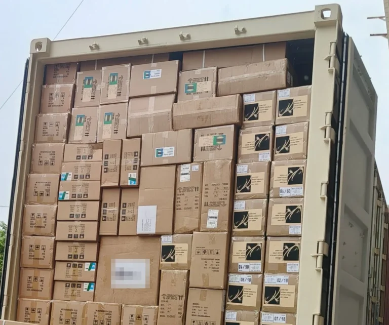 Fully loaded 40HQ container of mixed LED lighting cartons ready to be sealed for Australia